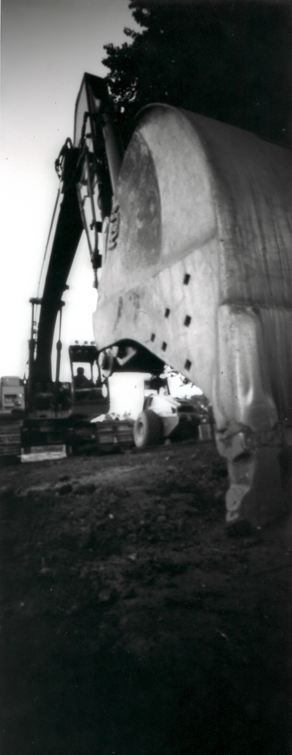 pinhole camera photo of a loader