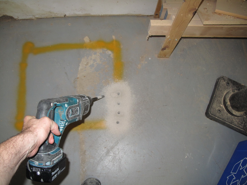 makita cordless rotary hammer drill and concrete floor.