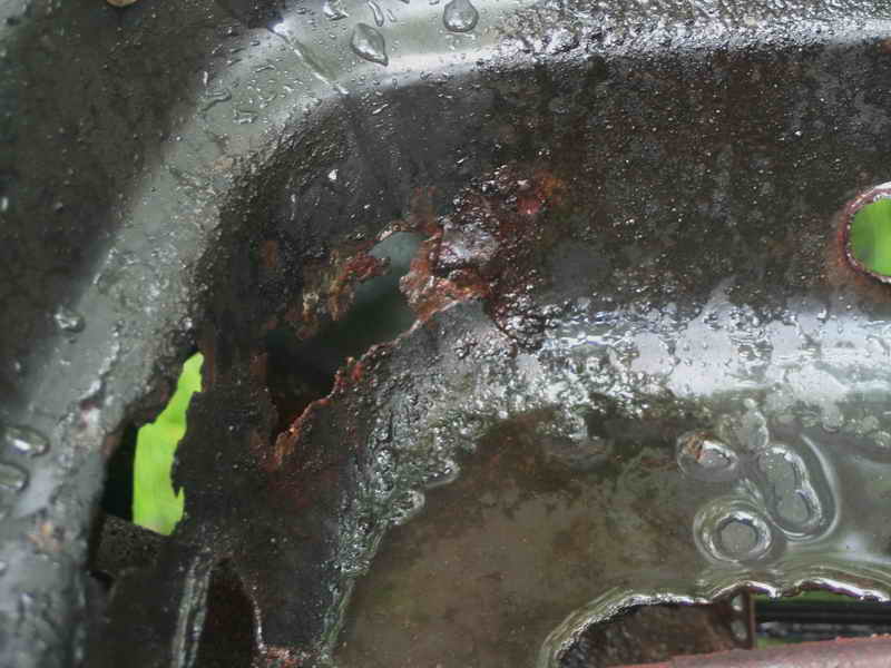holes rusted through bbq