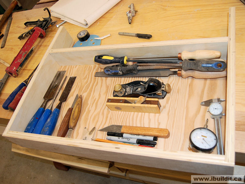 storage layout for tools in shallow drawer