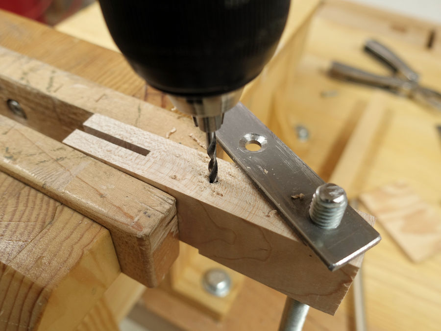 making a wood and steel bar clamp