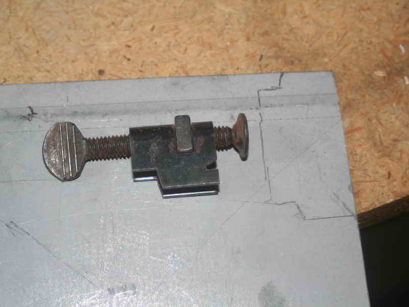 Radial arm store saw table clamps